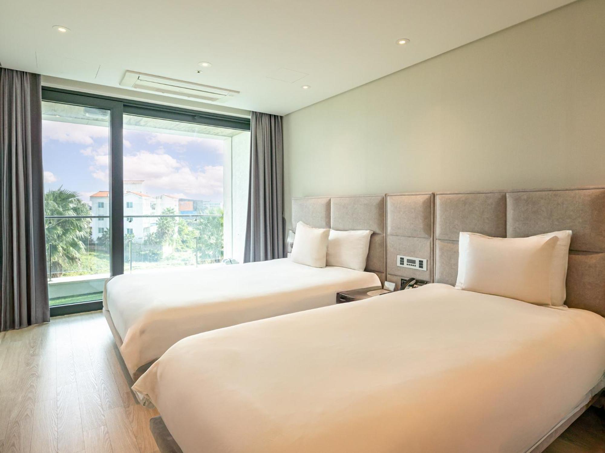 Jeju Attirance Hotel & Poolvilla Seogwipo Bagian luar foto